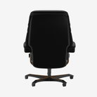 A black high-back office chair with a five-star wheeled base, shown from the rear against a light gray background.
